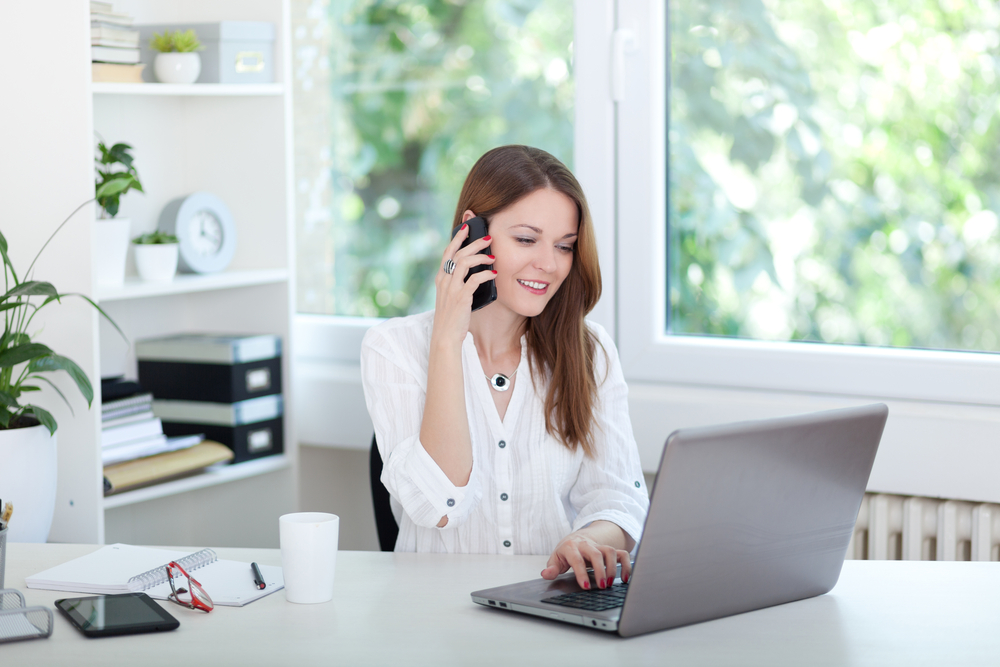 woman on phone shutterstock_301394078